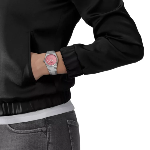 Tissot T137.210.11.331.00 PRX Quartz с розовым циферблатом на запястье